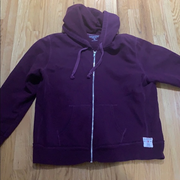 purple zip up sweater